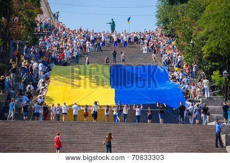 ODESSA, UKRAINE - August 23: Flash mob in city of Odessa on Potemkin Stairs on August 23, 2014, in day of a national flag of Ukraine.