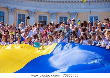 ODESSA, UKRAINE - August 23: Flash mob in city of Odessa on Potemkin Stairs on August 23, 2014, in day of a national flag of Ukraine.