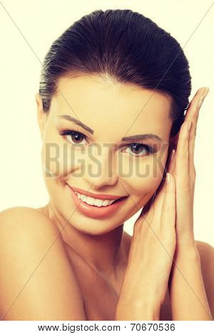 Baeutiful young woman portrait with healthy clean skin, isolated on white