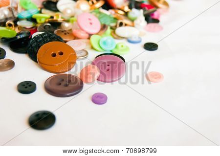 The Big Set Of Various Buttons On The White