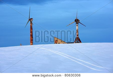 Wind turbines in winter landscape