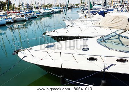 Yachts and boats in old port in Mediterranean sea