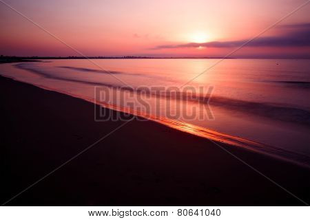 Sea long exposure photo. Twilight sunset. Slow shutter.
