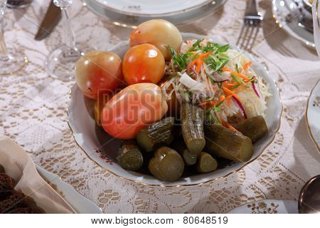 Marinaded Tomatoes And Cucumbers And Salty Cabbage