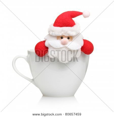 Santa ?laus in cup isolated on white background.