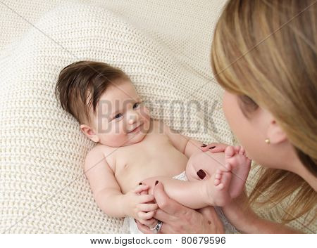 Mother Playing With Baby