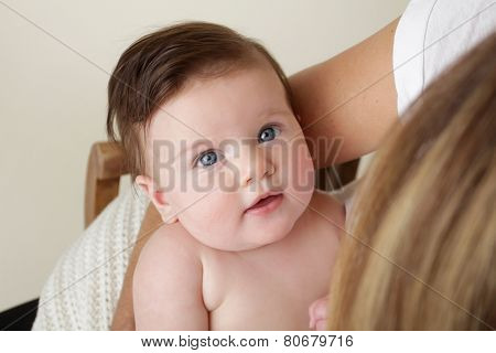 Mom Holding Newborn Baby