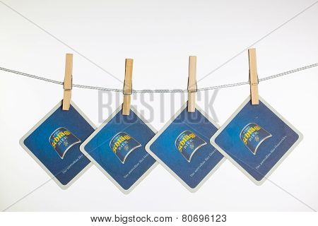 Beermats From Schlagl Beer Hanging From A Clothesline.
