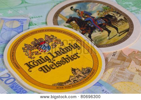 Beermats From Konig Ludwig Beer And Eur Banknotes..