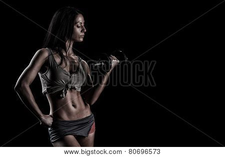 Brutal Athletic Woman Pumping Up Muscles With Dumbbells