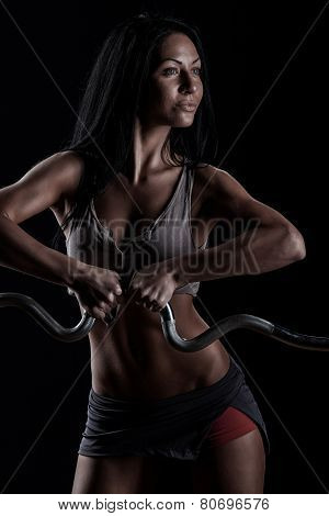 Brutal Athletic Woman Pumping Up Muscles With Dumbbells