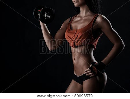 Brutal Athletic Woman Pumping Up Muscles With Dumbbells