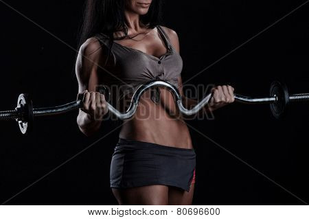 Brutal Athletic Woman Pumping Up Muscles With Dumbbells