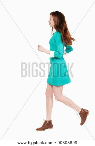 back view of running  woman. beautiful girl in motion. backside view of person.  Rear view people collection. Isolated over white background. smiling girl runs right