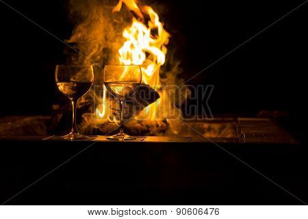 Two Wine Glasses Fire