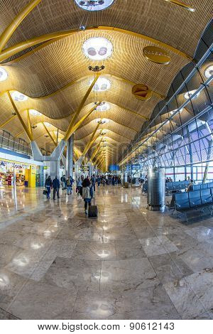 Passengers Walk By At The New Terminal T4 At Barajas Airport