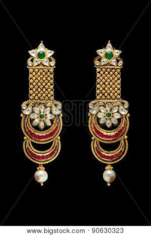 Close up of golden earrings