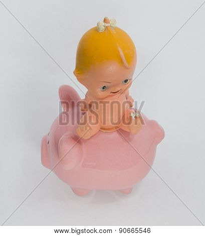 Baby on the piggy