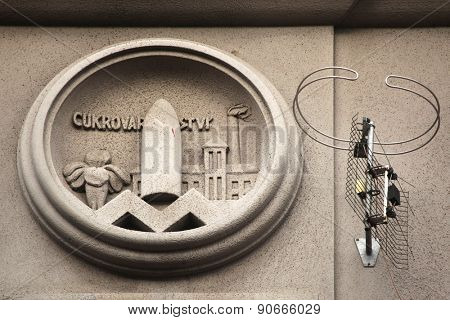 Allegory of Sugar Industry. Building decoration at Bubenecska Street in Prague, Czech Republic.