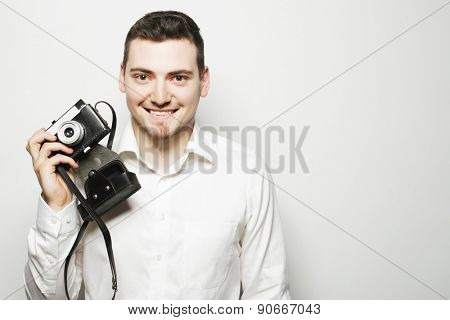technology, people and life style concept: young  photographer over white background
