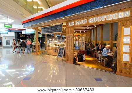 DUBAI, UAE - MARCH 10, 2015: DXB airport interior. Dubai International Airport is the primary airport serving Dubai, and is the world's busiest airport by international passenger traffic.