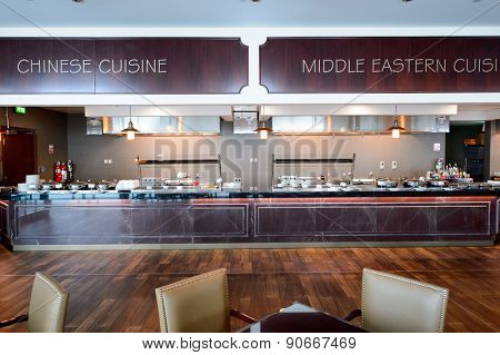 DUBAI, UAE - MARCH 10, 2015: DXB airport interior. Dubai International Airport is the primary airport serving Dubai, and is the world's busiest airport by international passenger traffic.