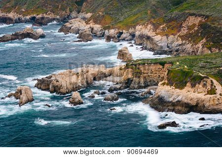 View Of Waves Crashing On Rocks Along The Pacific Coast, At Garrapata State Park, California.