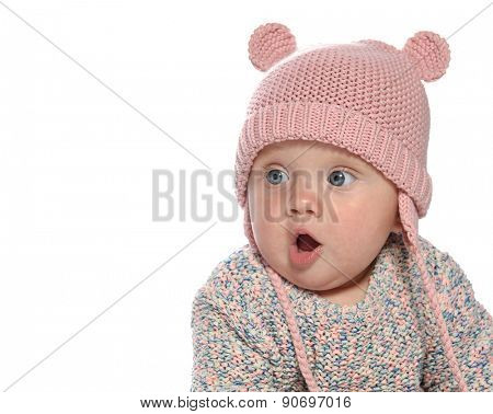 baby girl child  pink fashion portrait face studio shot isolated on white caucasian  hat warm clothing