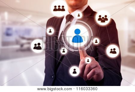 businessman points to icon-HR, recruitment and chosen concept
