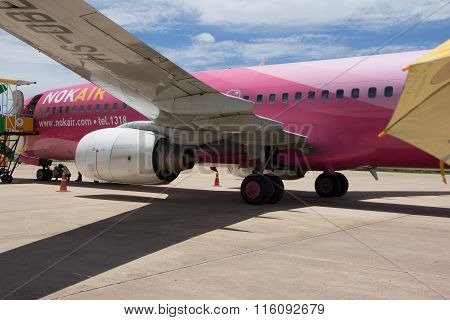 BANGKOKTHAILAND - AUGUST 242015 : Nok Air airline and passenger at Khon Kean Airport on August 242015 in Thailand.