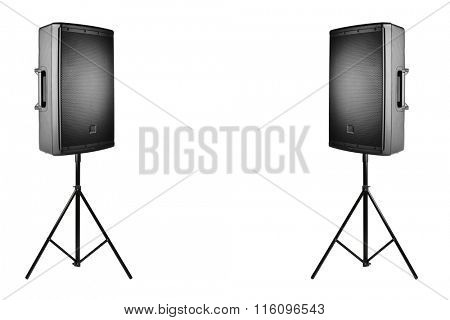 professional audio speakers PA on the tripods, isolated on white