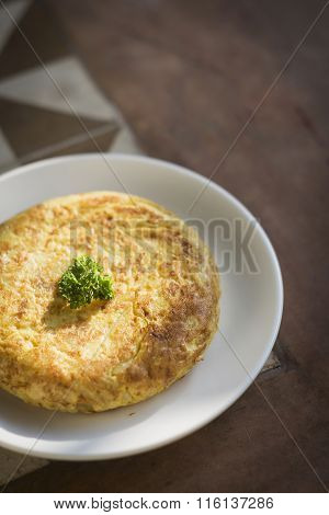 Spanish Tortilla Traditional Omelet On Rustic Tiles