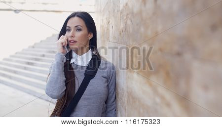 Woman on phone with atonished expression