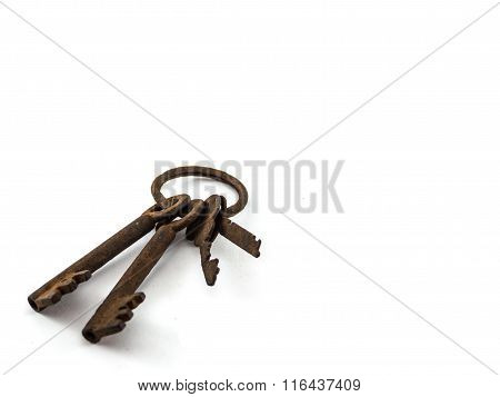 Old Rusty Key On White Background.