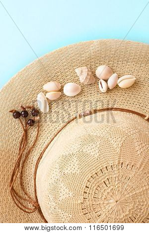 Summer Hat And Shells On Blue Bright Background
