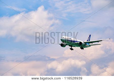 HONG KONG - JUNE 04, 2015: All Nippon Airways aircraft landing at Hong Kong airport. All Nippon Airways Co., Ltd., also known as ANA, is the largest airline in Japan