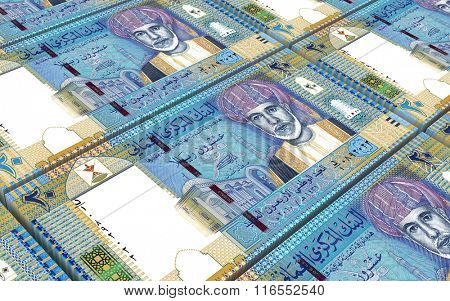 Omani rials bills stacked background. Computer generated 3D photo rendering.