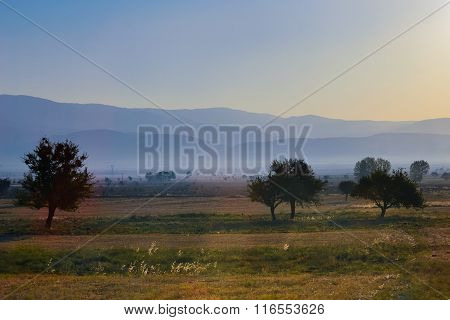View Of Mountains Across The Plain