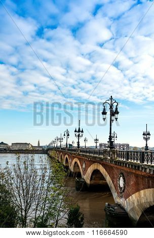 Bordeaux river bridge with St Michel cathedral, France