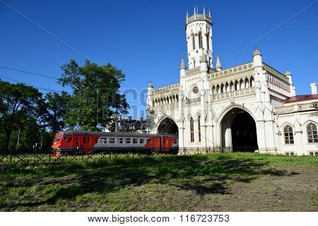 ST. PETERSBURG, RUSSIA - JUNE 7, 2015: Commuter train departs from the train station Novy Peterhof. The station was built in 1854-1857 by design of N Benois
