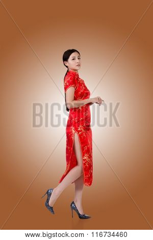 Chinese woman in traditional cheongsam in the new year