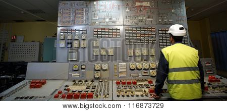 Operator At Work Place In The System Control Room