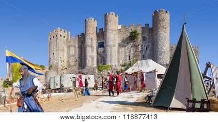 Obidos, Portugal - August 09, 2015: Obidos Castle during the Medieval Fair reenactment. Obidos is a medieval town inside walls, and very popular among tourists.