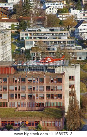 Helicopter Landing On The Hospital Roof In Thun Town