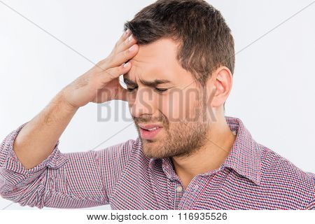 Close Up Photo Of Pretty  Man Suffering Of Headache