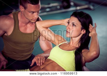 Fitness Youple Workout - Fit Mann And Woman Train In Gym