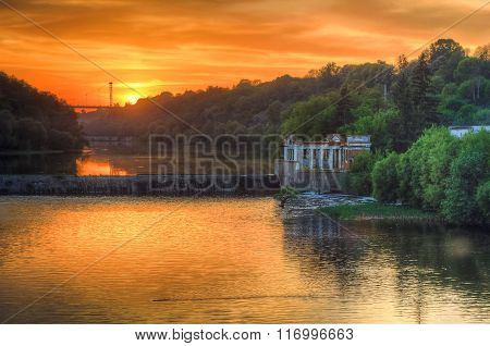 Sundown at river dam