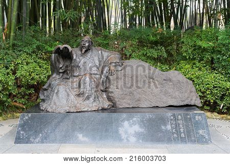 Chengdu, China - Nov 28, 2017: HanYu chinese Tang dynasty poet statue in HuanHuaXi public park.