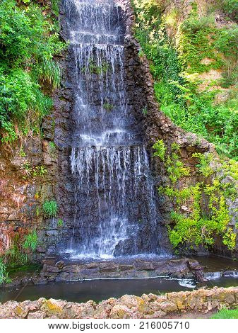 Beautiful waterfall flowing at Krape Park in northern Illinois
