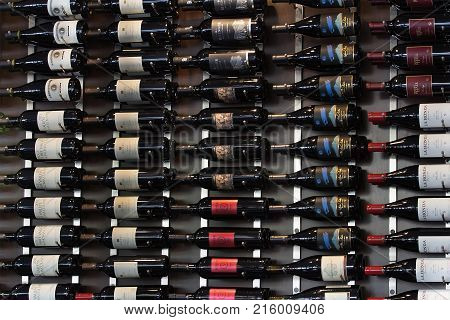 Los Gatos USA - October 08 2015: Wine Bottle Holder Rack with wine bottels in Hults restaurant.